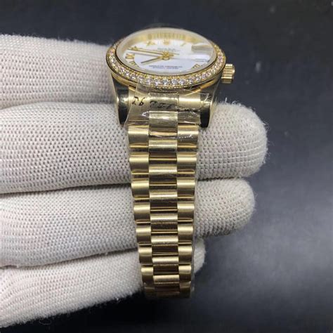 iced fake rolex - Rolex iced out bezel.